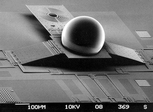Optical components can include lenses like this ball lens (Ming C. Wu, UCLA Electrical Engineering Dept).
